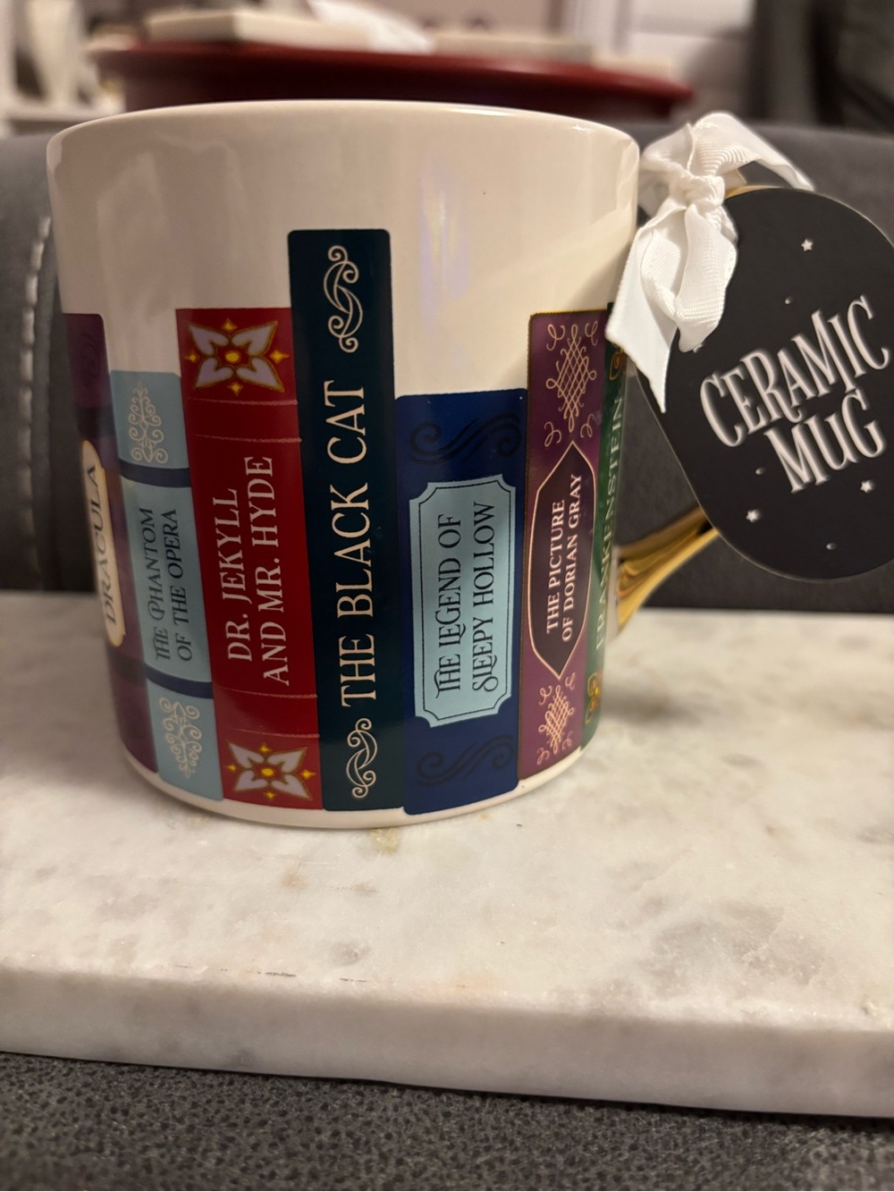 Unique Ceramic Book-Spine Coffee Mug in White with Multicolor Book Design
